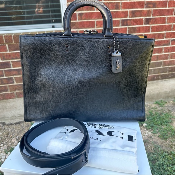 Coach Handbags - Coach Rogue Brief, Leather. New Without Tag, Includes Dust Bag.